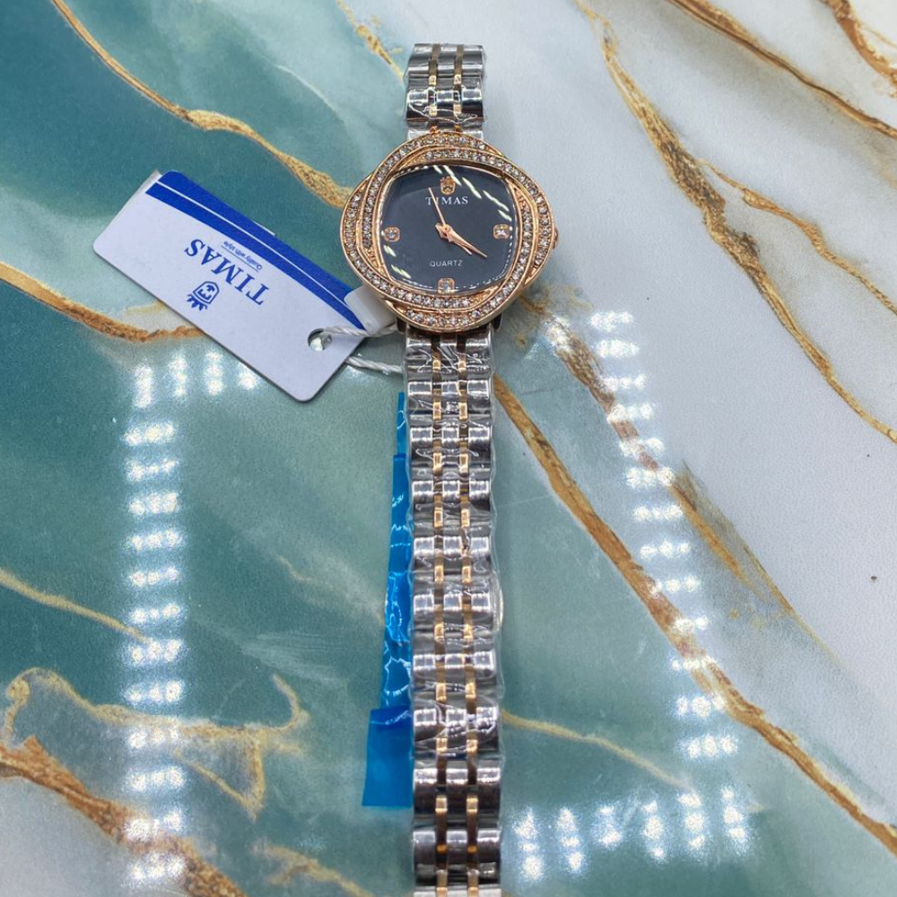 TMS  Elegant Crystal Bezel Women’s Luxury Quartz Watch