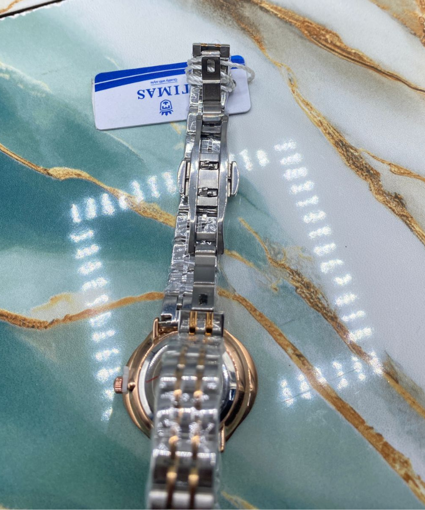 TMS  Elegant Crystal Bezel Women’s Luxury Quartz Watch