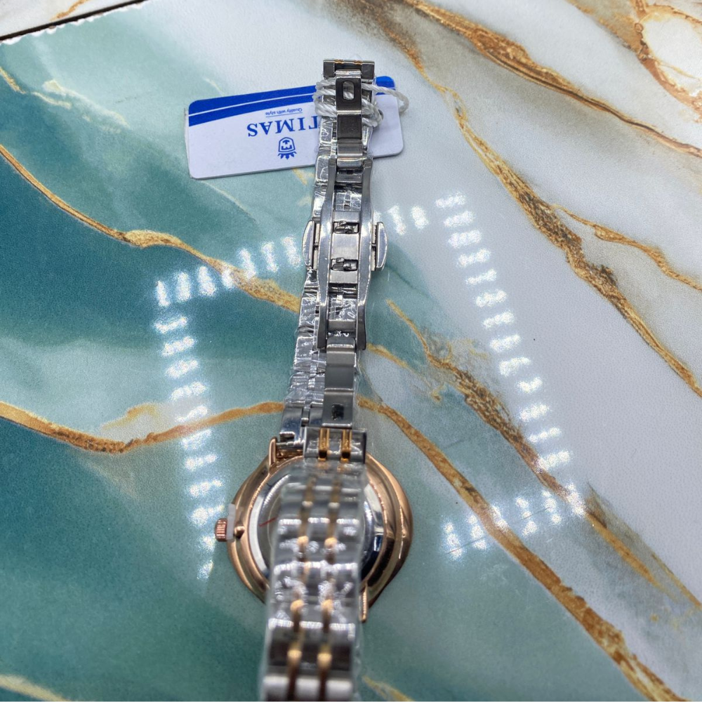 TMS  Elegant Crystal Bezel Women’s Luxury Quartz Watch